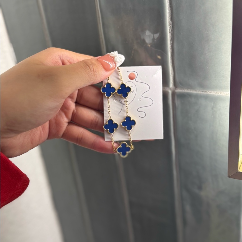 Elegant Royal Blue and Gold Clover Bracelet